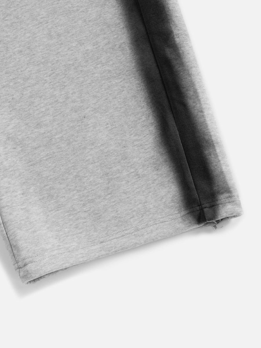 Pantalones deportivos holgados con corazon de grafiti